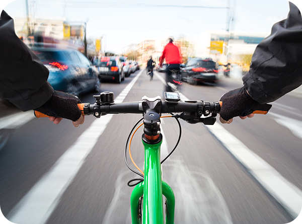 Photo of the road ahead in motion from a cyclist's perspective