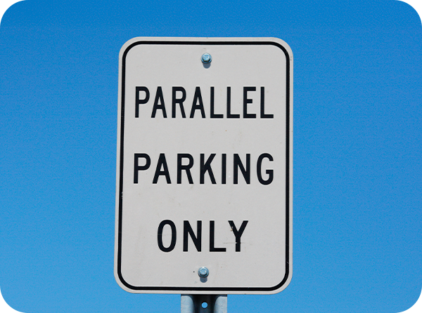 Photo of traffic sign that says "Parallel Parking Only"