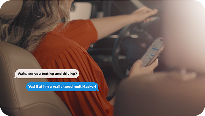 Photo of woman texting and driving