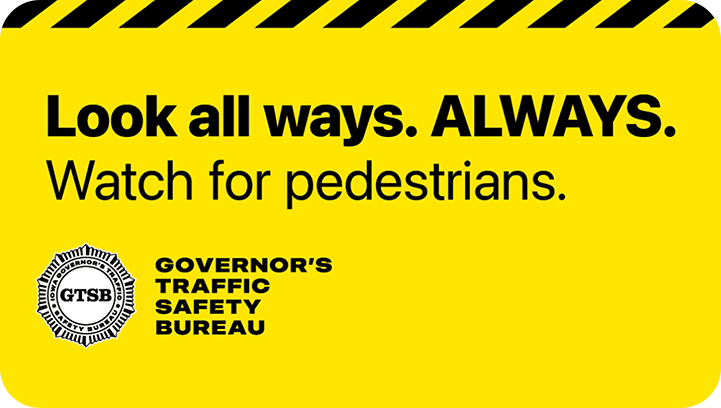 Image that says “Look all ways, always. Watch for pedestrians.”